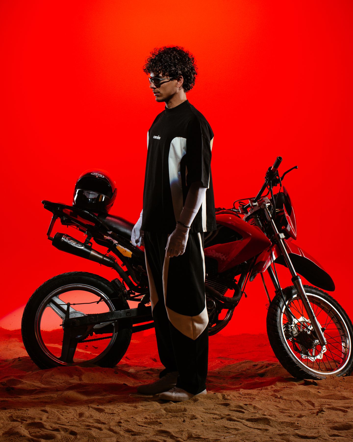 Model standing by the motorbike